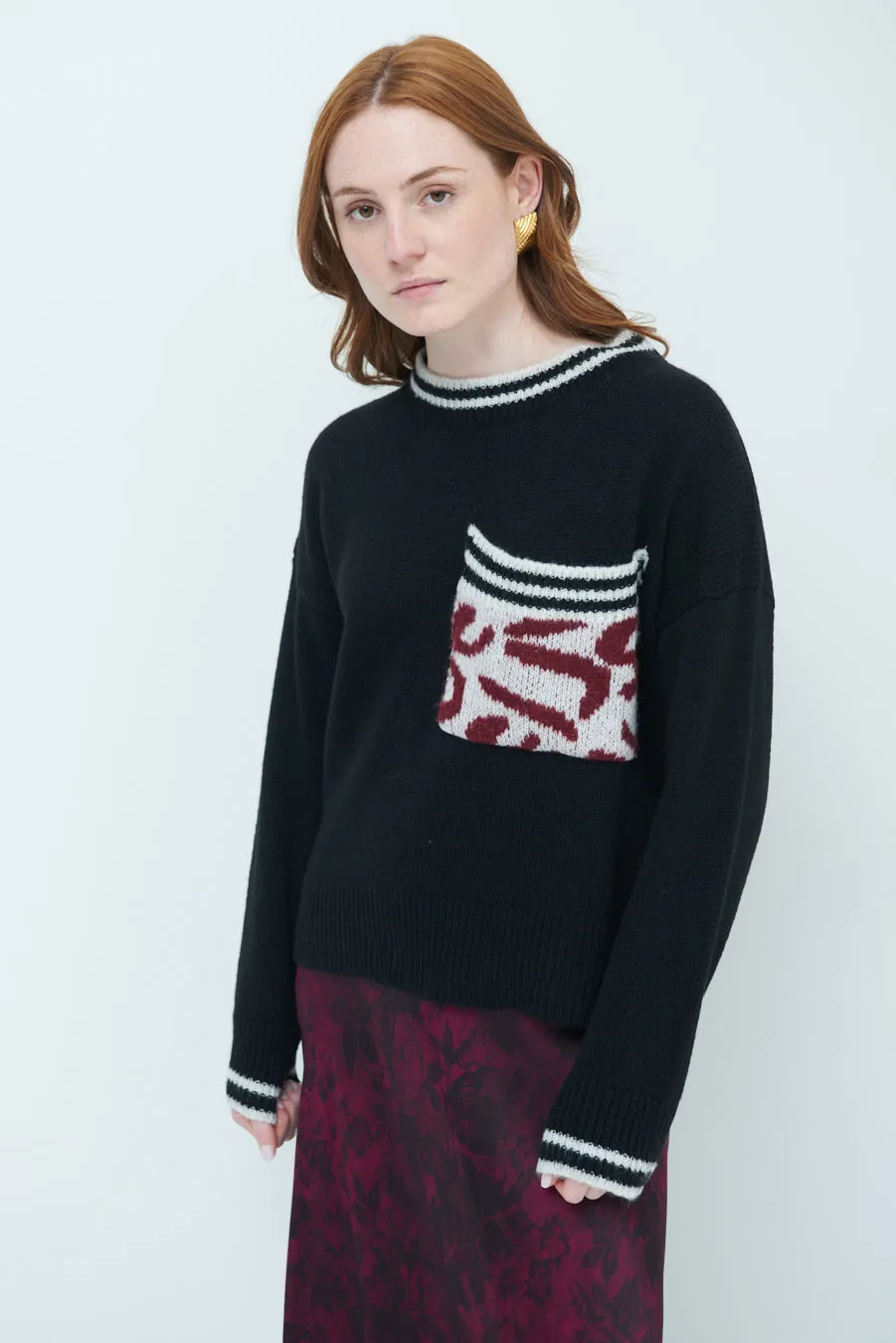 Cozy sweater with animal print pocket wholesale